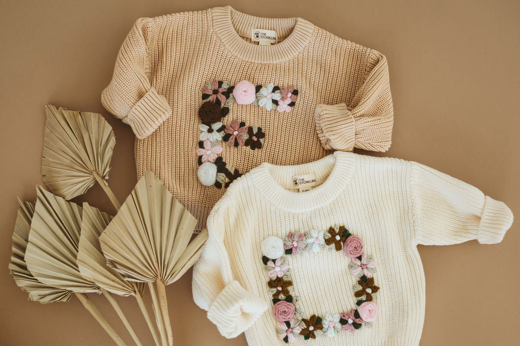 Hand-Embroidered Baby Sweater "E"