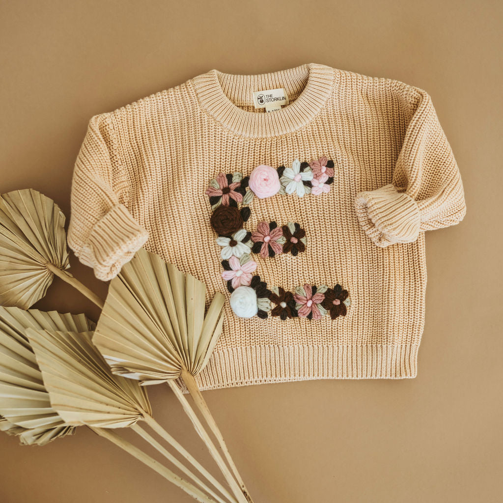 Hand-Embroidered Baby Sweater "E"