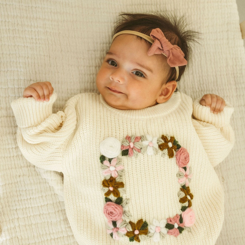 Hand-Embroidered Baby Sweater "D"