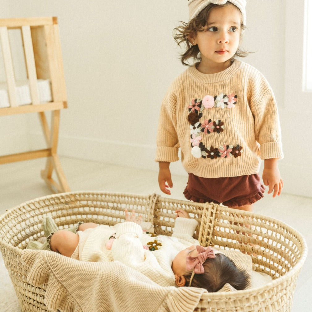 Hand-Embroidered Baby Sweater "E"