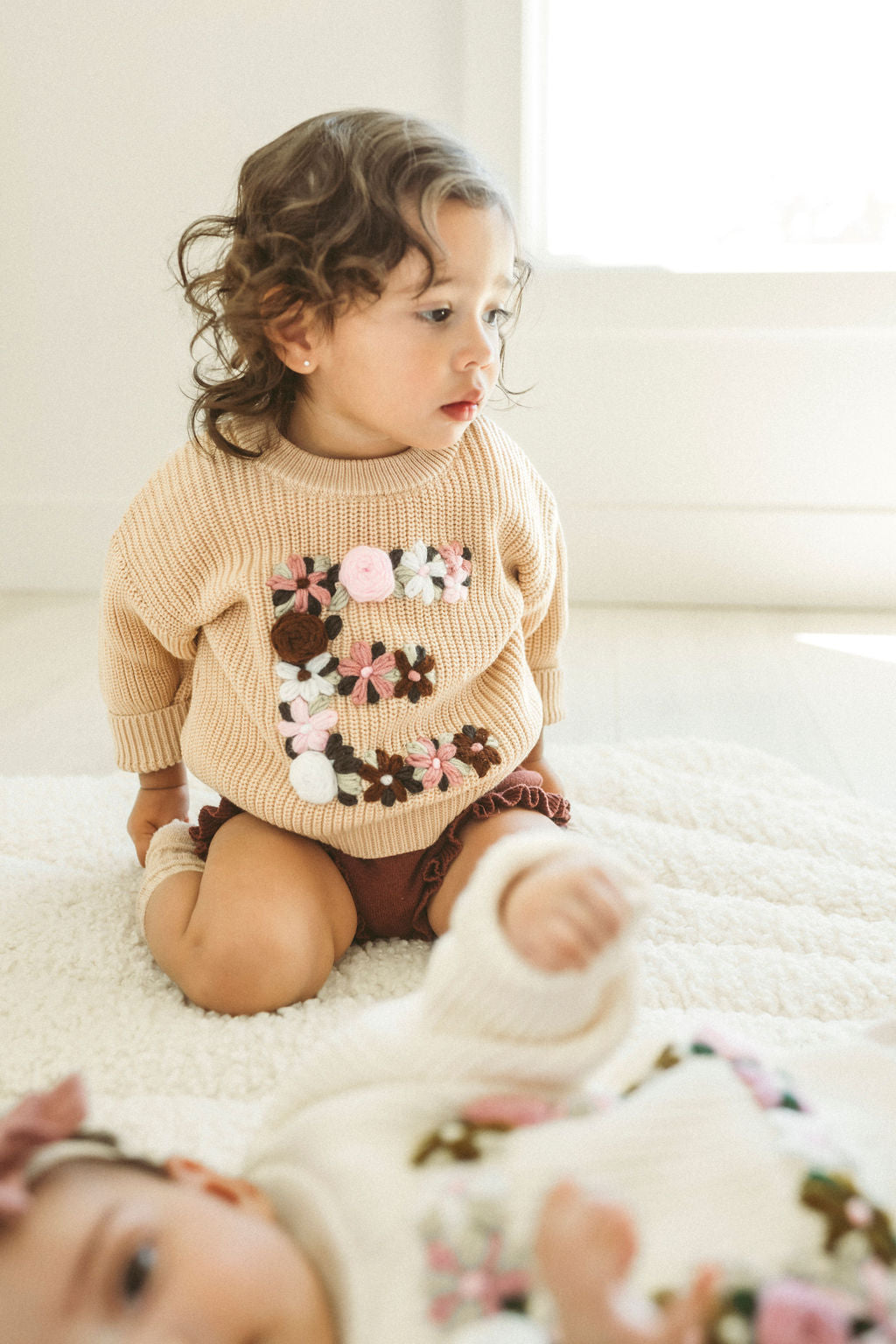 Hand-Embroidered Baby Sweater "E"