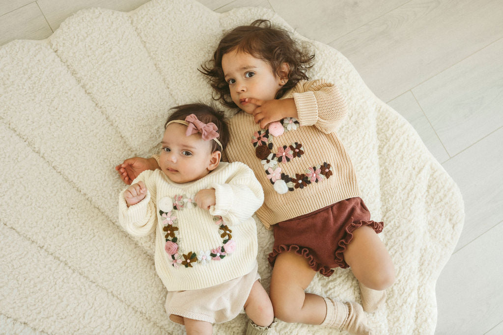 Hand-Embroidered Baby Sweater "E"