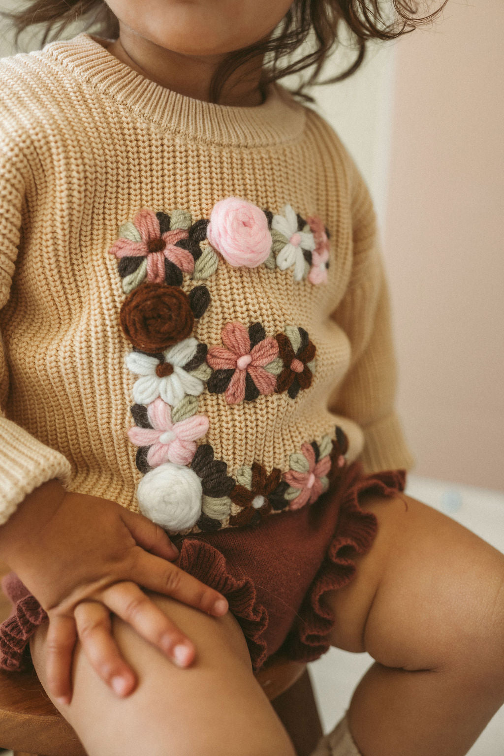 Hand-Embroidered Baby Sweater "E"