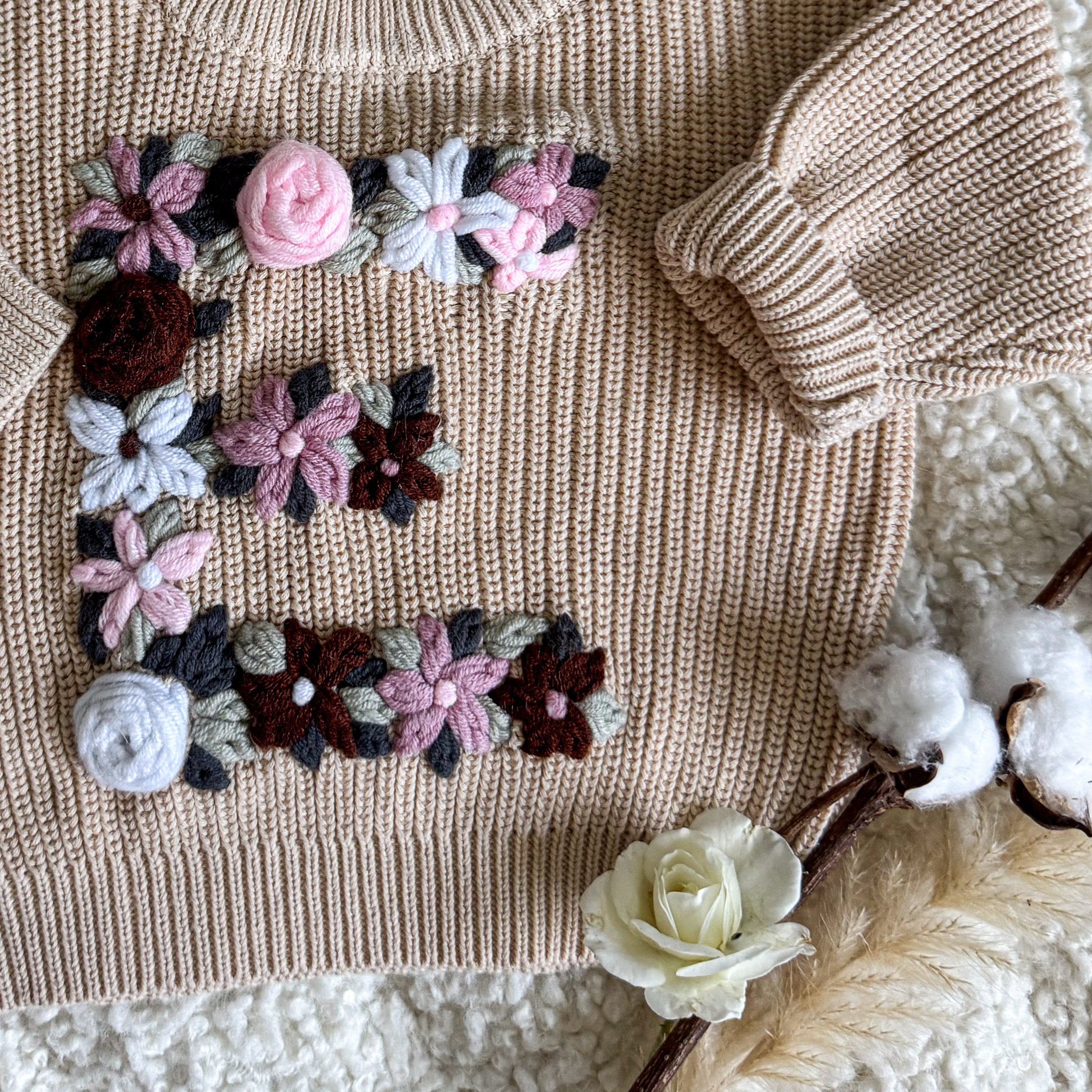 Hand-Embroidered Baby Sweater "E"