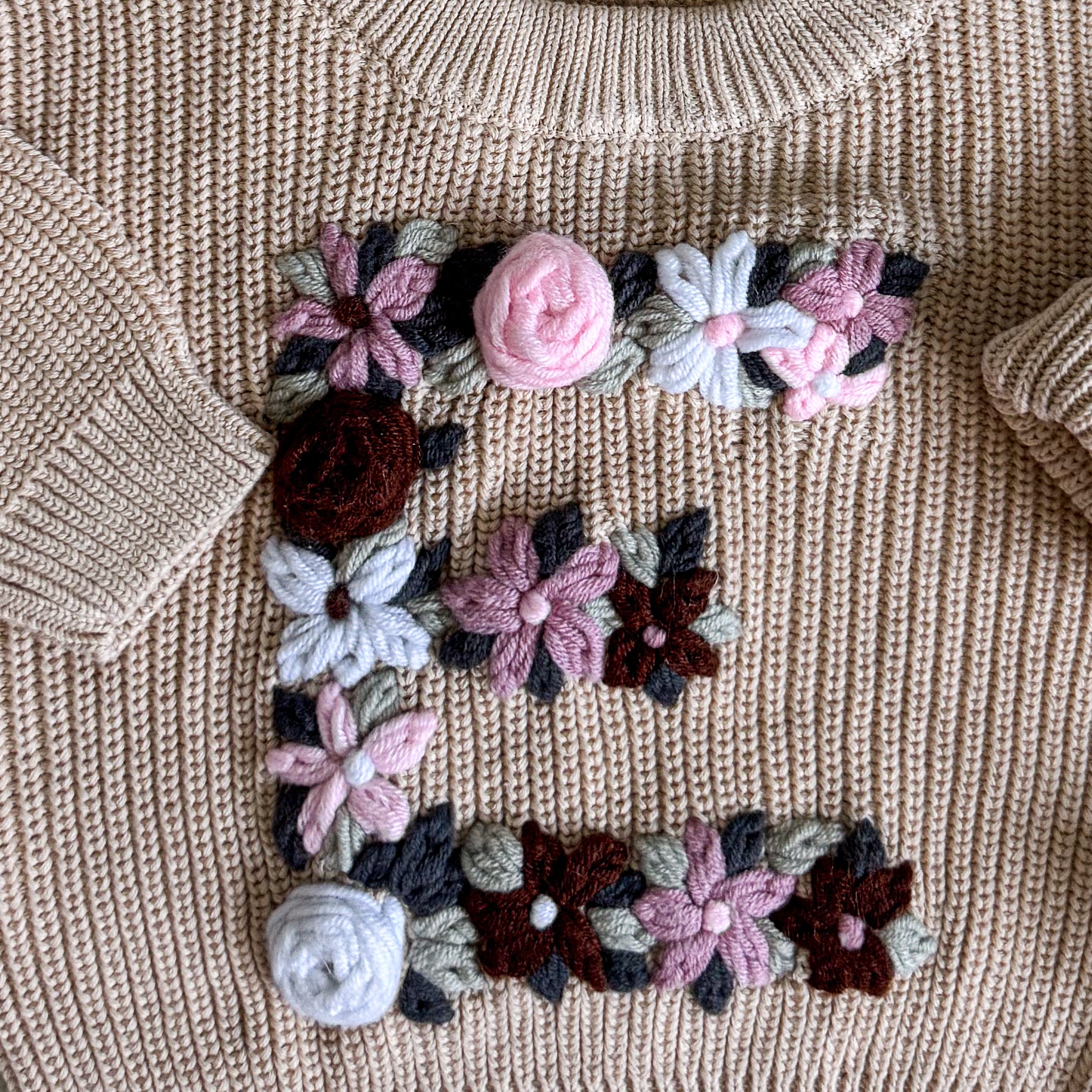 Hand-Embroidered Baby Sweater "E"