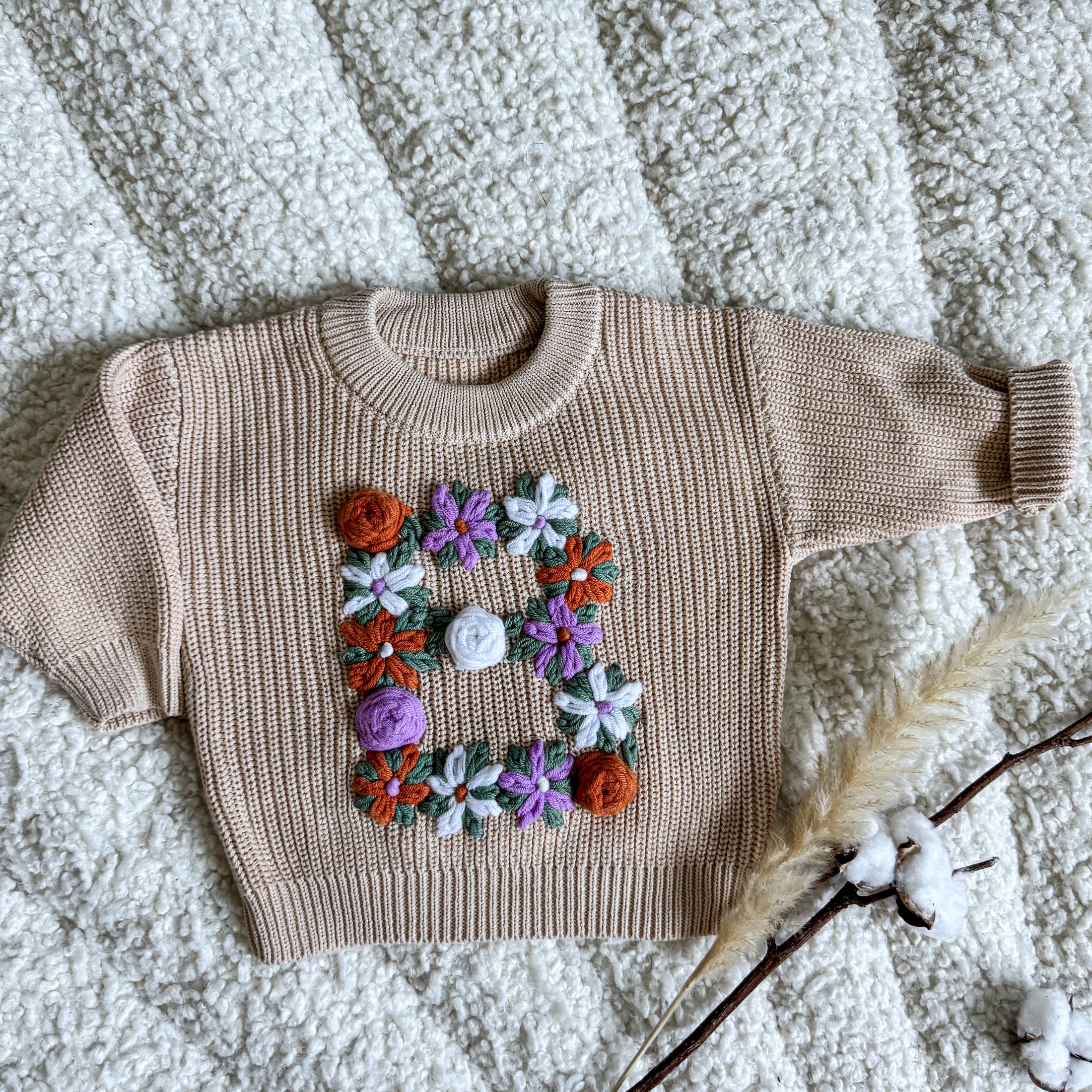 Hand-Embroidered Baby Sweater "B"