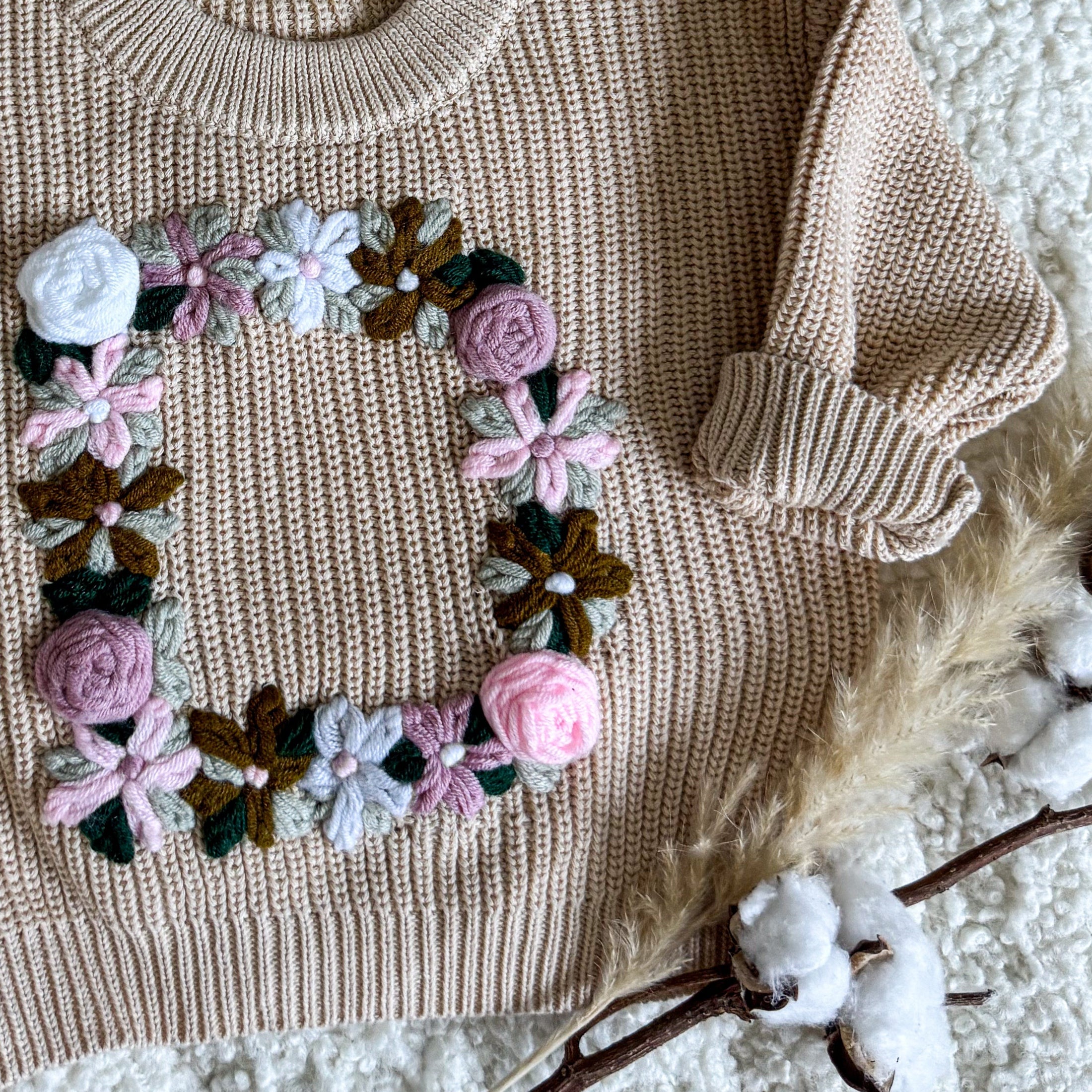 Hand-Embroidered Baby Sweater "D"